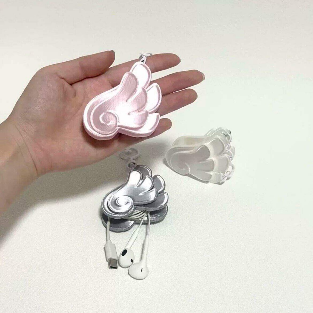 حلقة مفاتيح على شكل جناح ملاك  - مراجعة Cable Winder Keychain وسعره