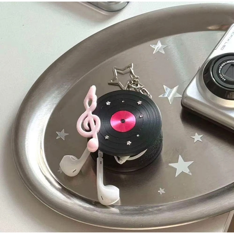 منظم أسلاك سماعات الرأس على شك - مراجعة Cable Winder Keychain وسعره