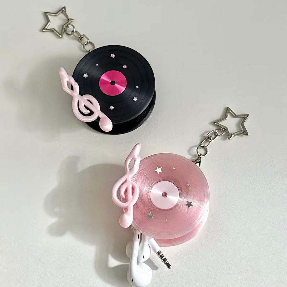 منظم كابلات على شكل قرص فينيل  - مراجعة Cable Winder Keychain وسعره