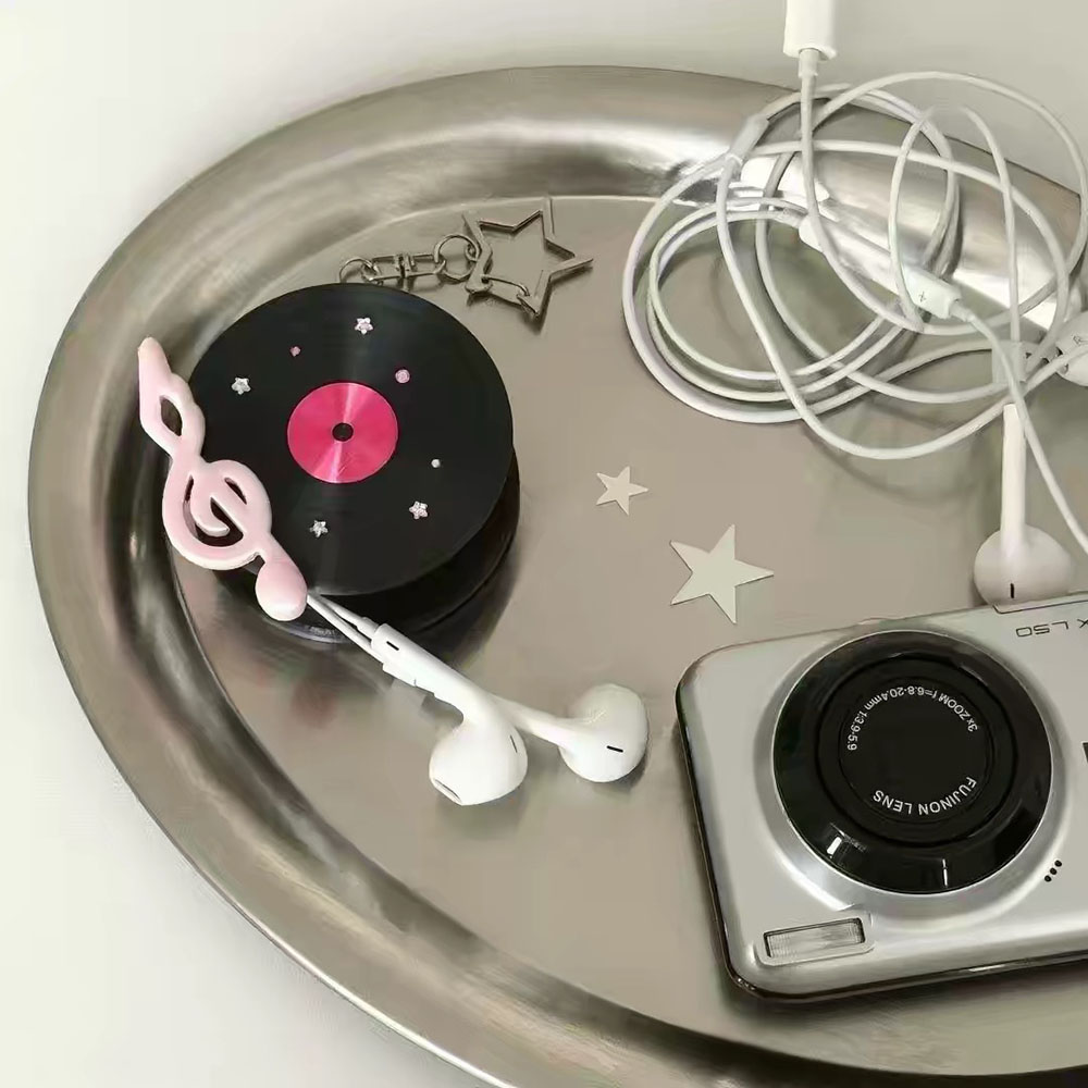 منظم كابلات على شكل قرص فينيل  - مراجعة Cable Winder Keychain وسعره