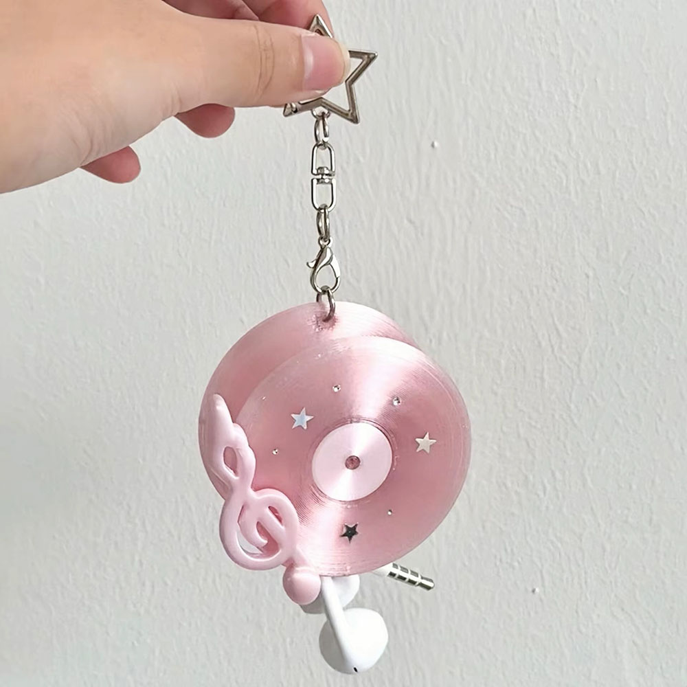 منظم كابلات على شكل قرص فينيل  - مراجعة Cable Winder Keychain وسعره